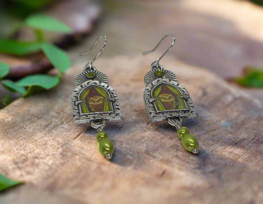 https://www.artistryjewelry.net/products/lovely-owl-in-the-window-earrings