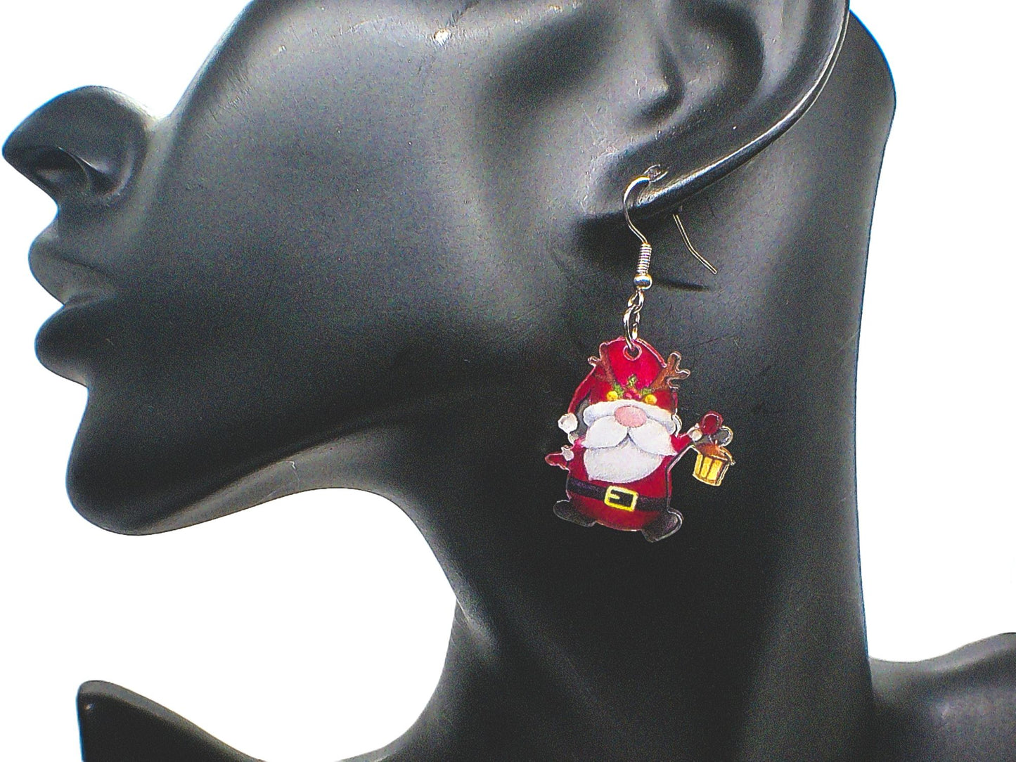 https://www.artistryjewelry.net/products/happy-santa-earrings