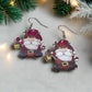 https://www.artistryjewelry.net/products/happy-santa-earrings