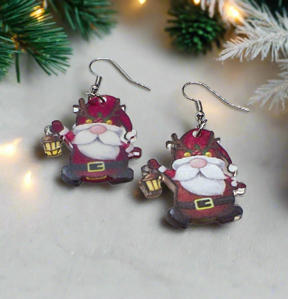 https://www.artistryjewelry.net/products/happy-santa-earrings