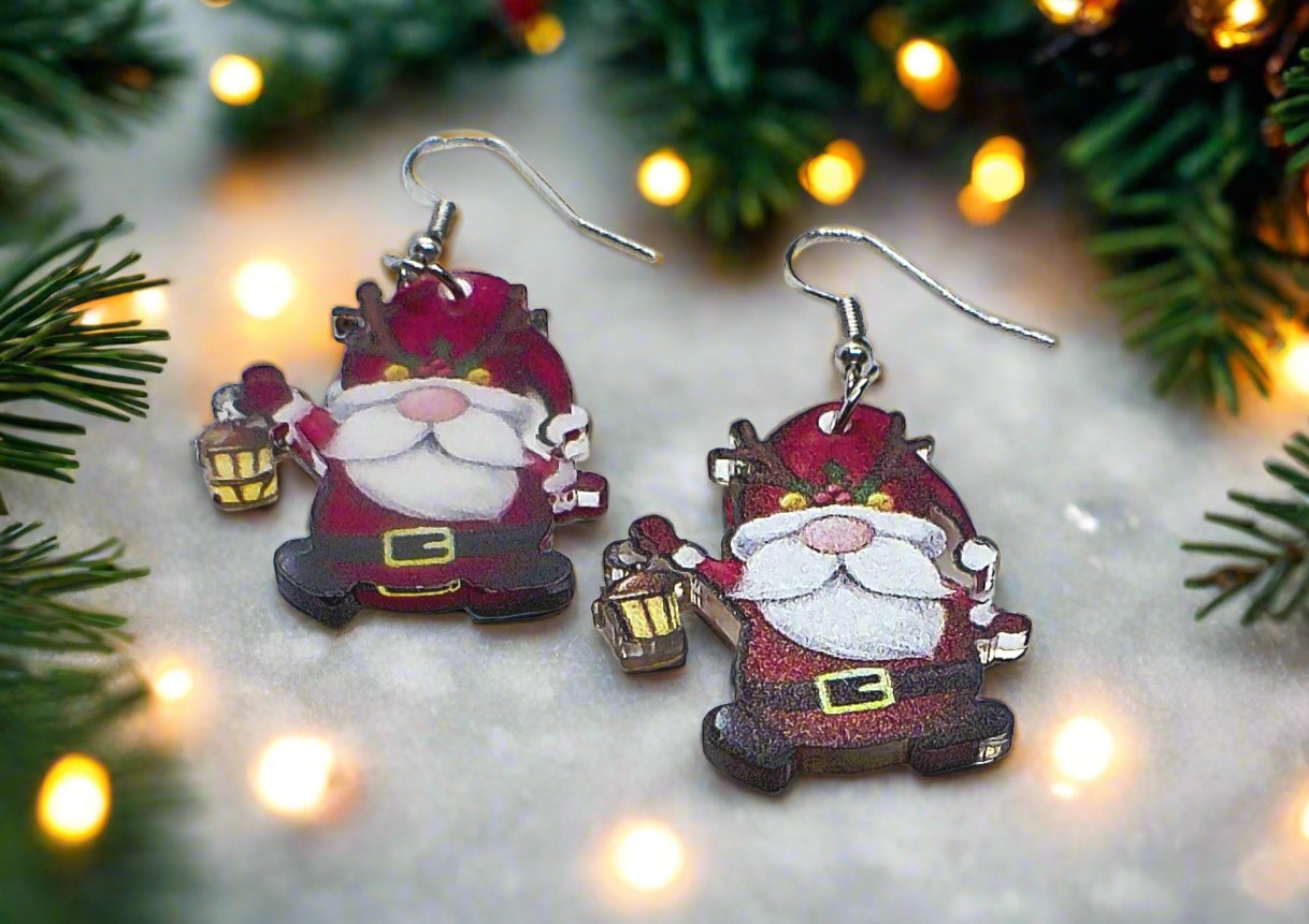 https://www.artistryjewelry.net/products/happy-santa-earrings