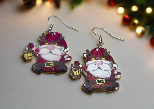 https://www.artistryjewelry.net/products/happy-santa-earrings