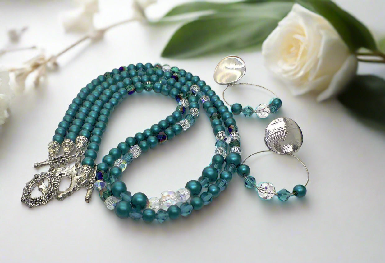 https://www.artistryjewelry.net/products/teal-perfection-necklace-set