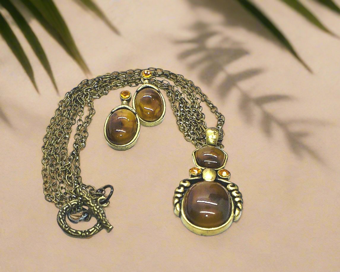 https://www.artistryjewelry.net/products/marvelous-antique-brown-necklace-set