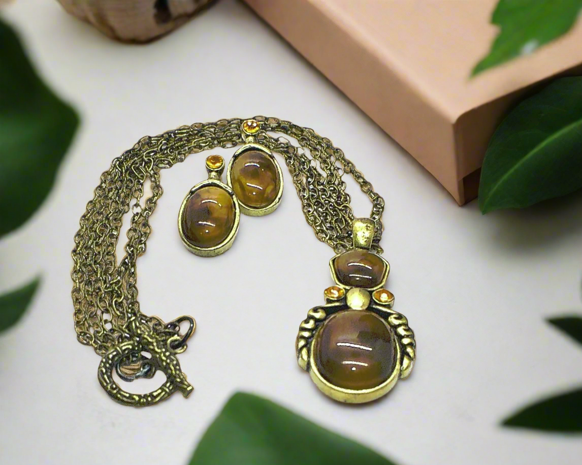 https://www.artistryjewelry.net/products/marvelous-antique-brown-necklace-set