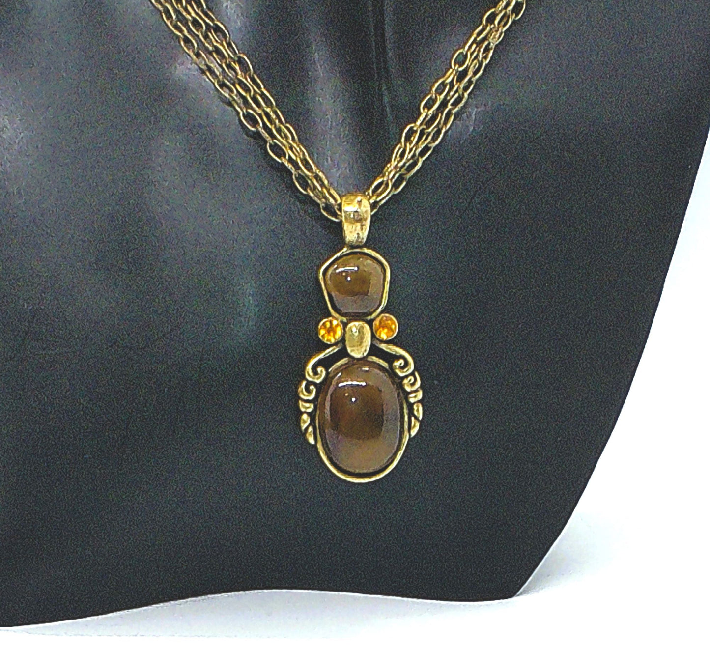 https://www.artistryjewelry.net/products/marvelous-antique-brown-necklace-set