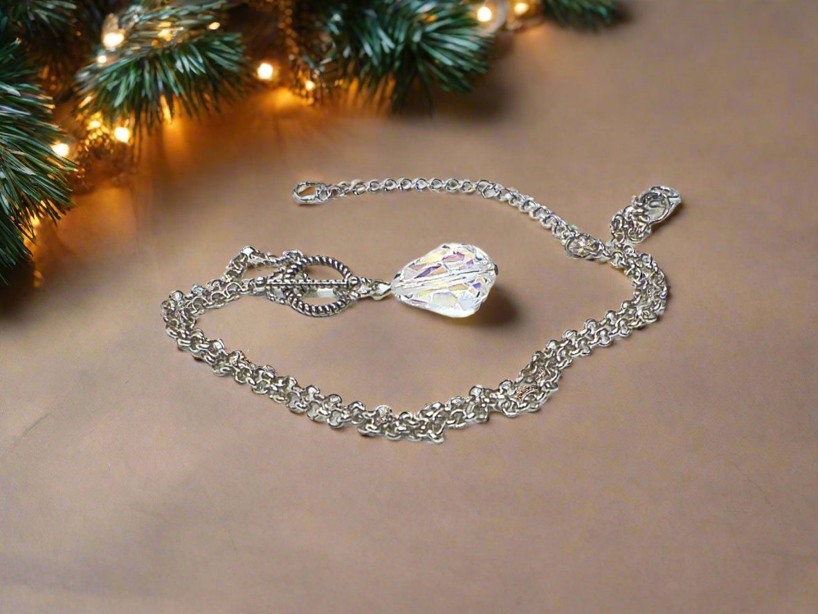 https://www.artistryjewelry.net/products/copy-of-strands-of-silver-opera-necklace