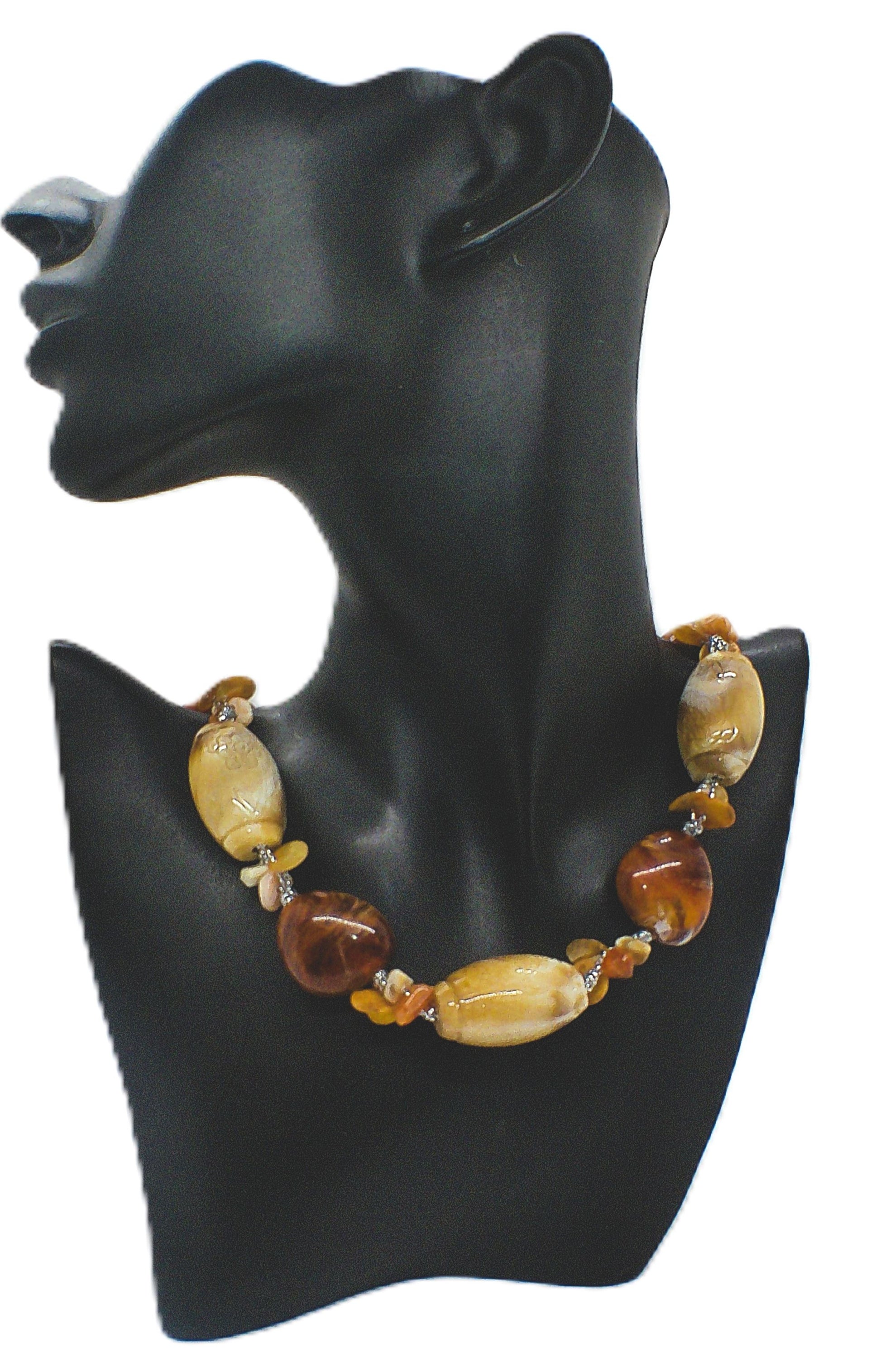 https://www.artistryjewelry.net/products/shells-galore-necklace