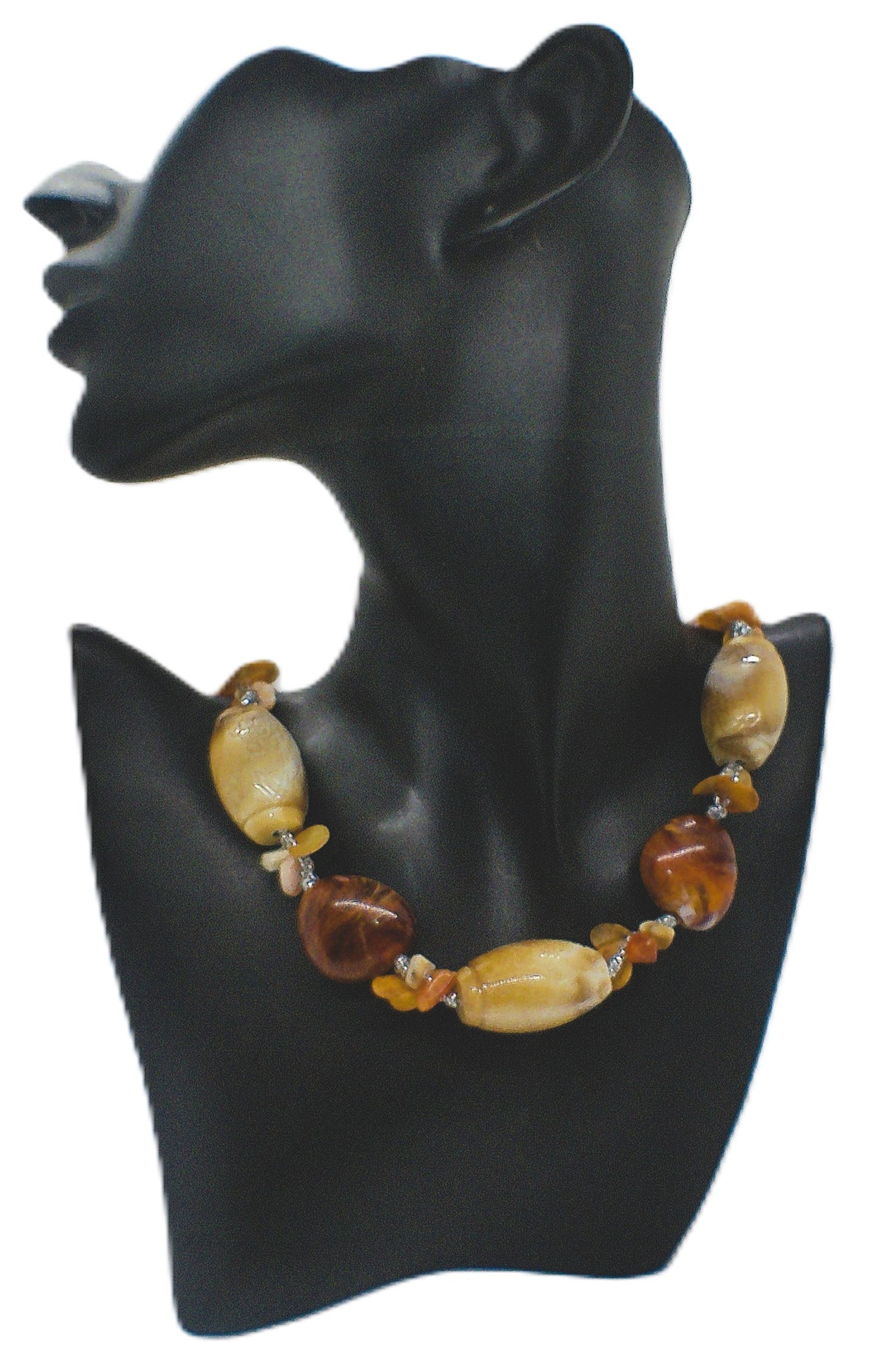 https://www.artistryjewelry.net/products/shells-galore-necklace