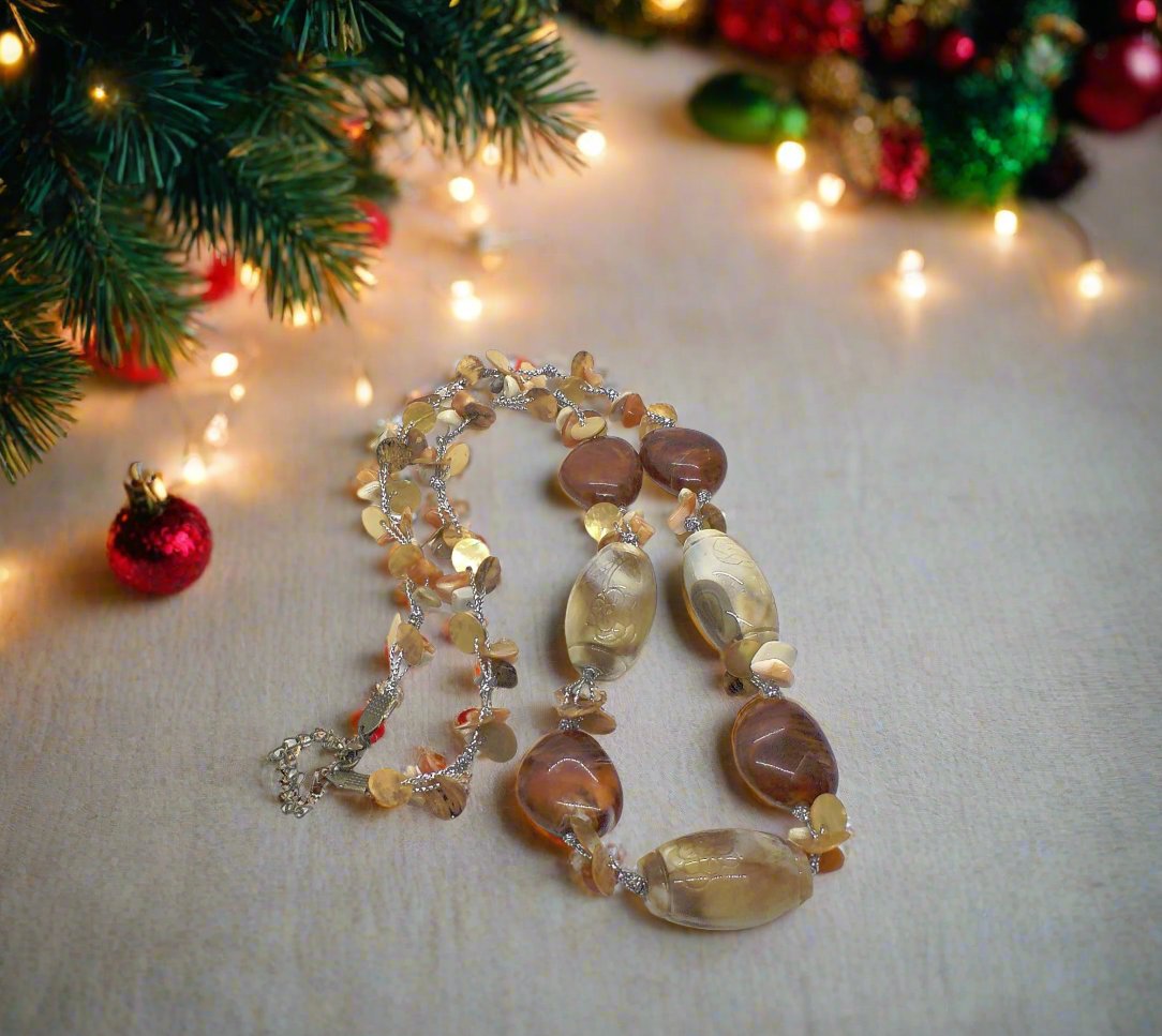 https://www.artistryjewelry.net/products/shells-galore-necklace