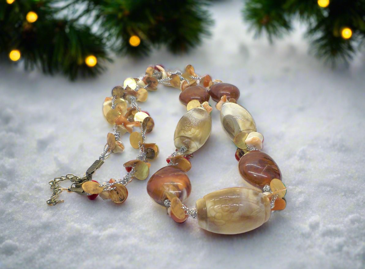 https://www.artistryjewelry.net/products/shells-galore-necklace