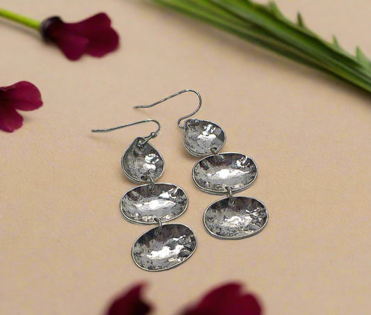 https://www.artistryjewelry.net/products/multi-disc-drop-earrings