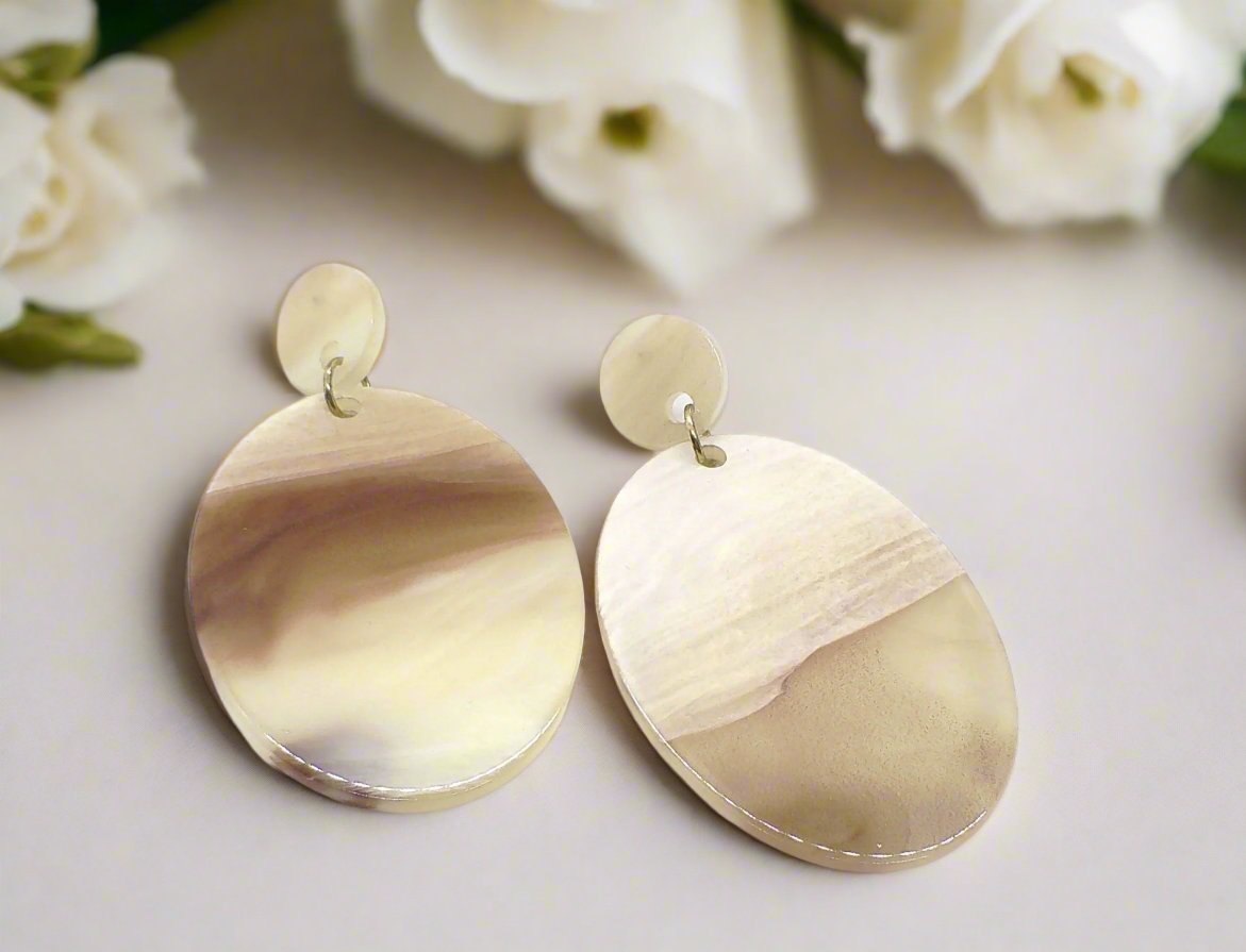 https://www.artistryjewelry.net/products/marble-finish-earrings