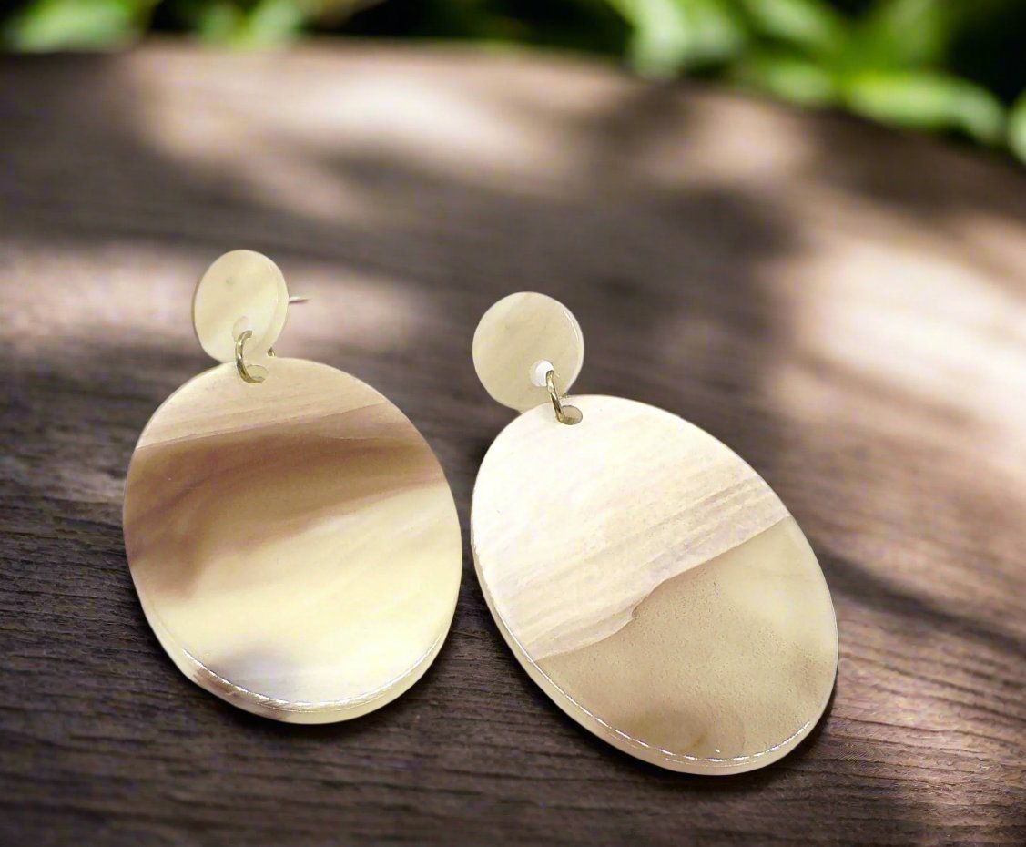 https://www.artistryjewelry.net/products/marble-finish-earrings