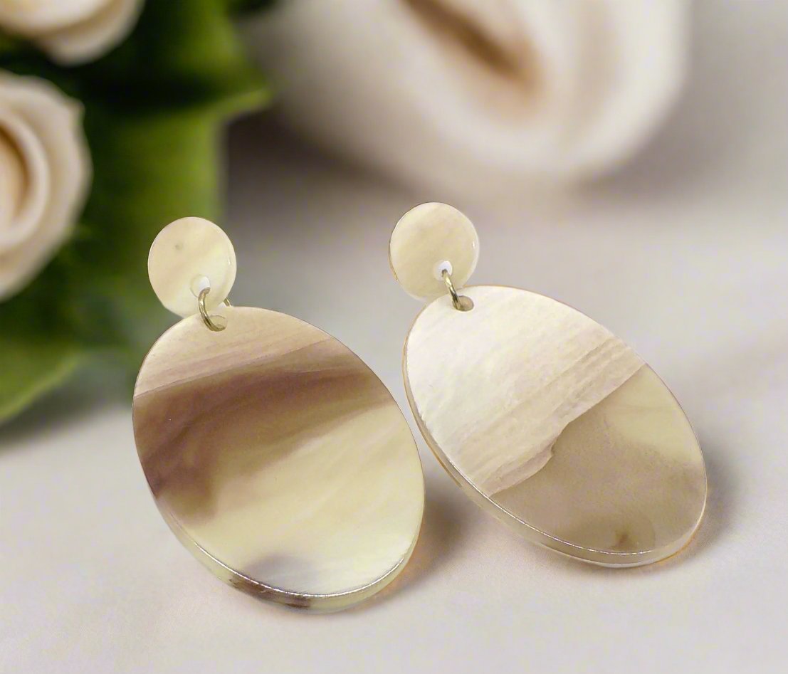 https://www.artistryjewelry.net/products/marble-finish-earrings