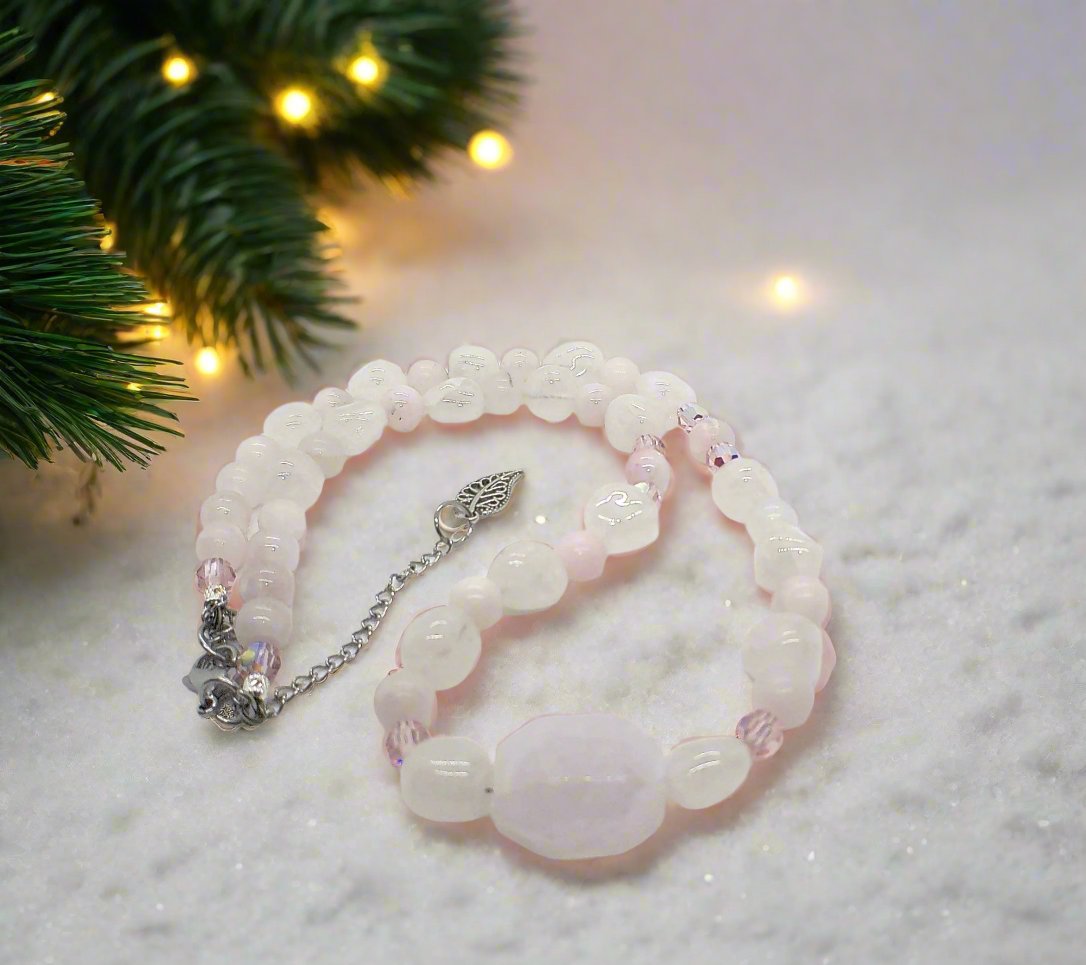 https://www.artistryjewelry.net/products/stunning-rose-pink-quartz-and-crystals-semi-precious-beaded-necklace-handcrafted-by-artistry-jewelry