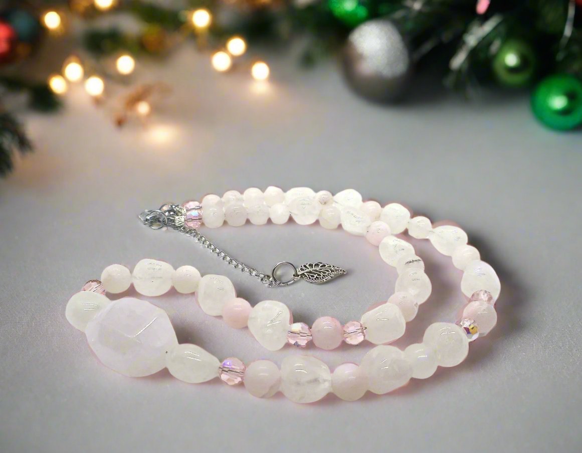 https://www.artistryjewelry.net/products/stunning-rose-pink-quartz-and-crystals-semi-precious-beaded-necklace-handcrafted-by-artistry-jewelry