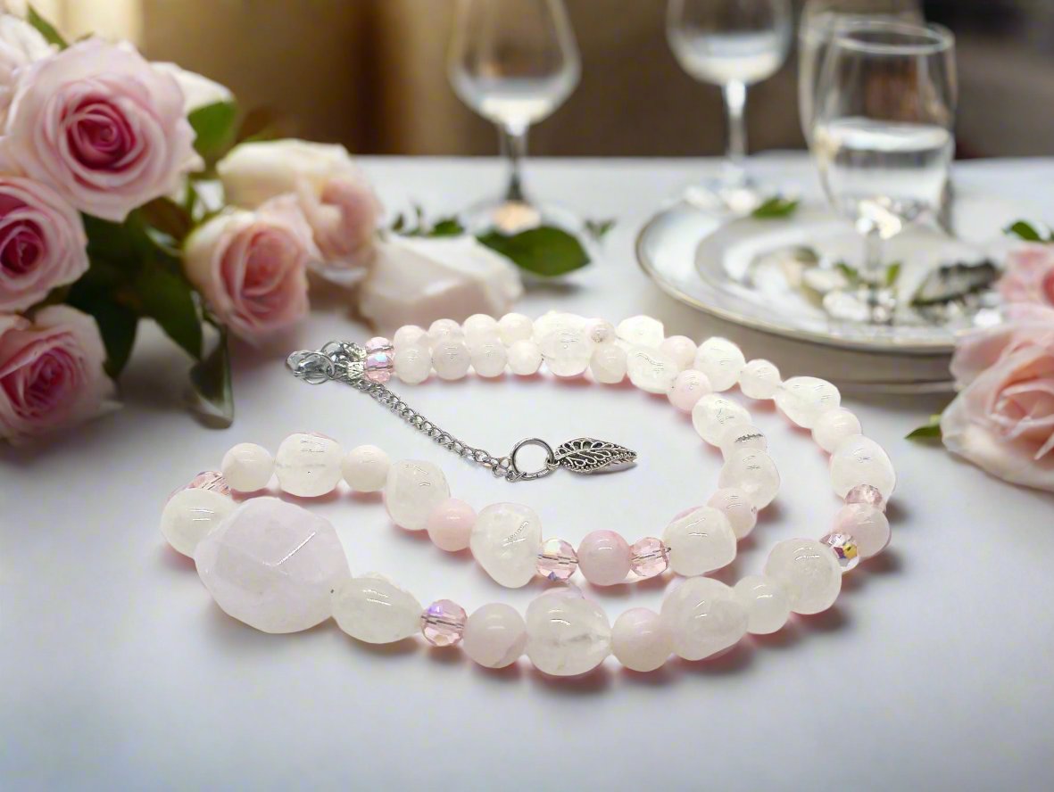 https://www.artistryjewelry.net/products/stunning-rose-pink-quartz-and-crystals-semi-precious-beaded-necklace-handcrafted-by-artistry-jewelry