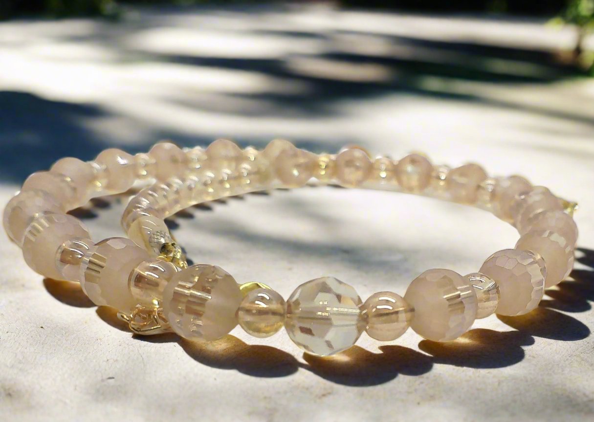 https://www.artistryjewelry.net/products/beautiful-peach-amber-crystal-and-cream-golden-shadow-beaded-necklace-set-handcrafted-by-artistry-jewelry