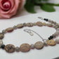 https://www.artistryjewelry.net/products/lovely-pink-feldspar-maifanite-jasper-black-brown-gray-semi-precious-beaded-necklace-handcrafted-by-artistry-jewelry