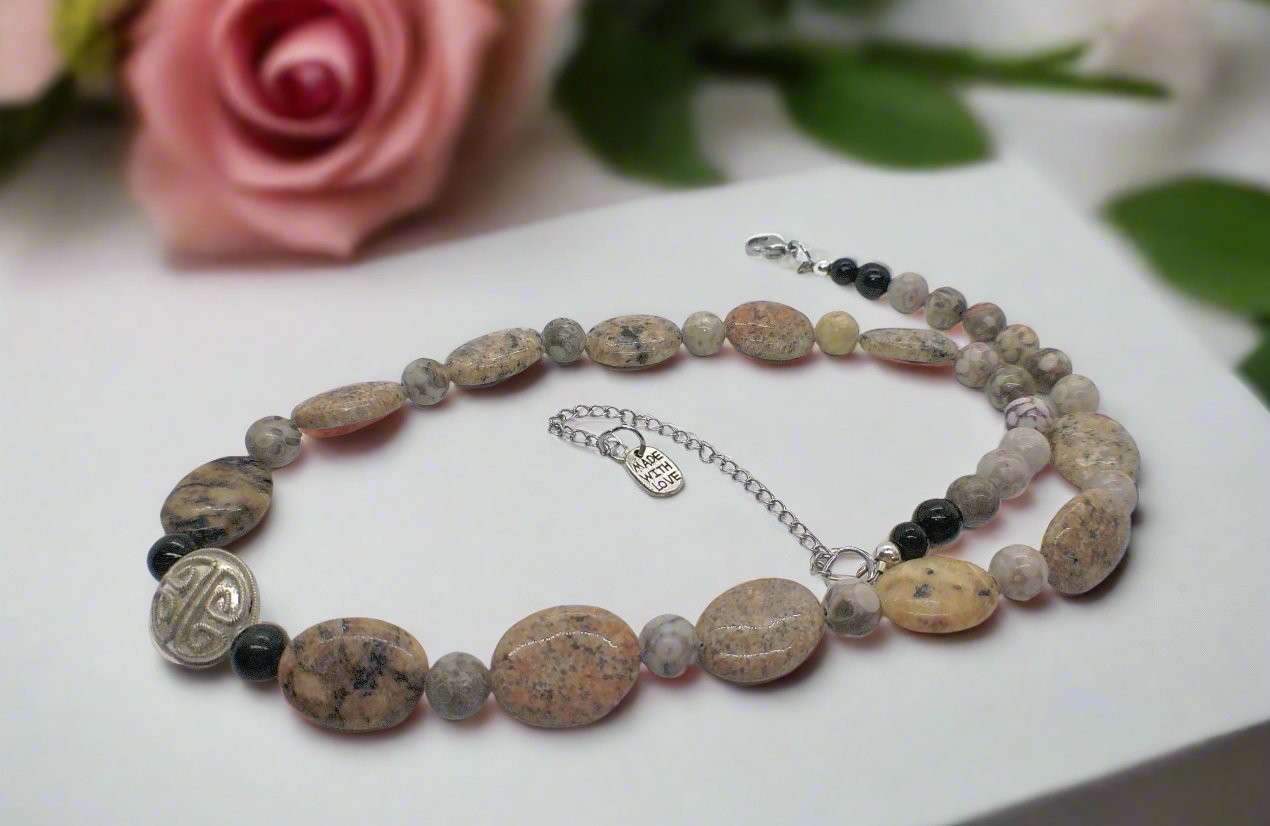 https://www.artistryjewelry.net/products/lovely-pink-feldspar-maifanite-jasper-black-brown-gray-semi-precious-beaded-necklace-handcrafted-by-artistry-jewelry