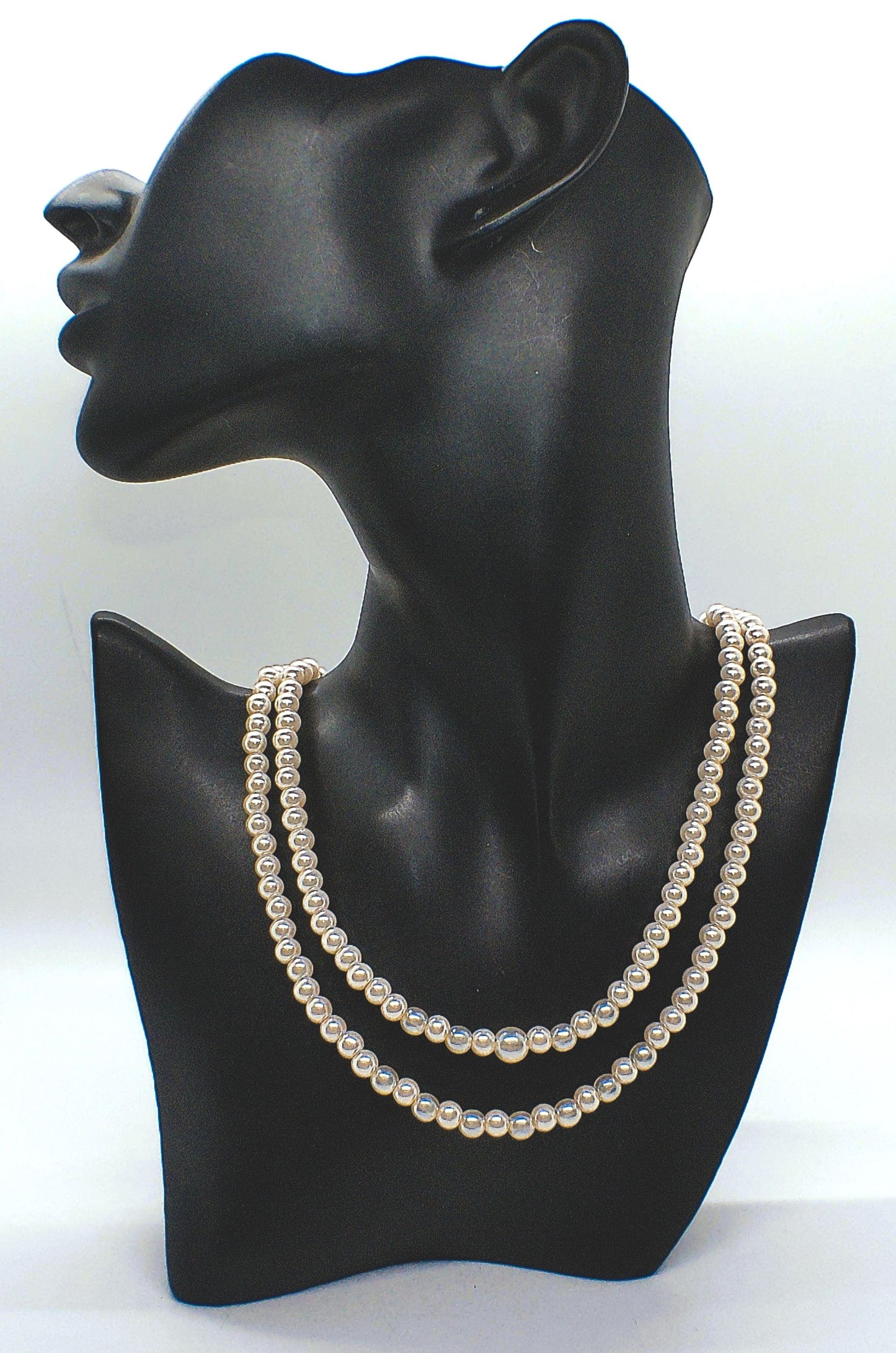 Beautiful Light Peach, Stardust, and Pearl, Two-Strand Beaded Necklace handcrafted by Artistry Jewelry