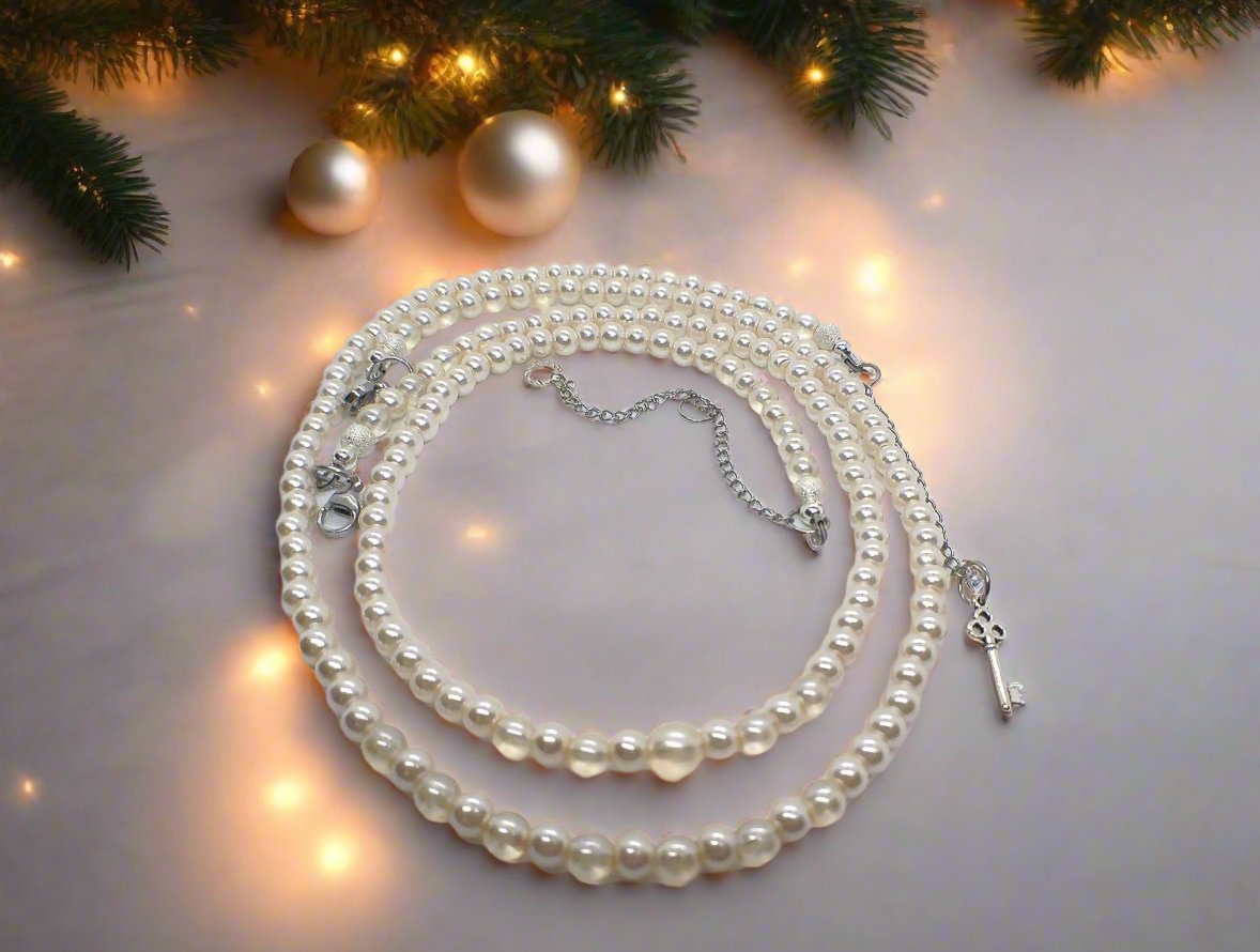 https://www.artistryjewelry.net/products/beautiful-light-peach-stardust-and-pearl-two-strand-beaded-necklace-handcrafted-by-artistry-jewelry