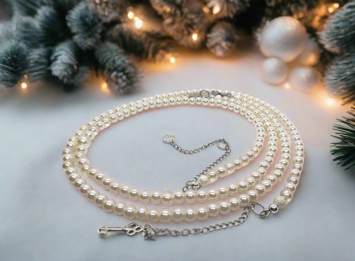 https://www.artistryjewelry.net/products/beautiful-light-peach-stardust-and-pearl-two-strand-beaded-necklace-handcrafted-by-artistry-jewelry