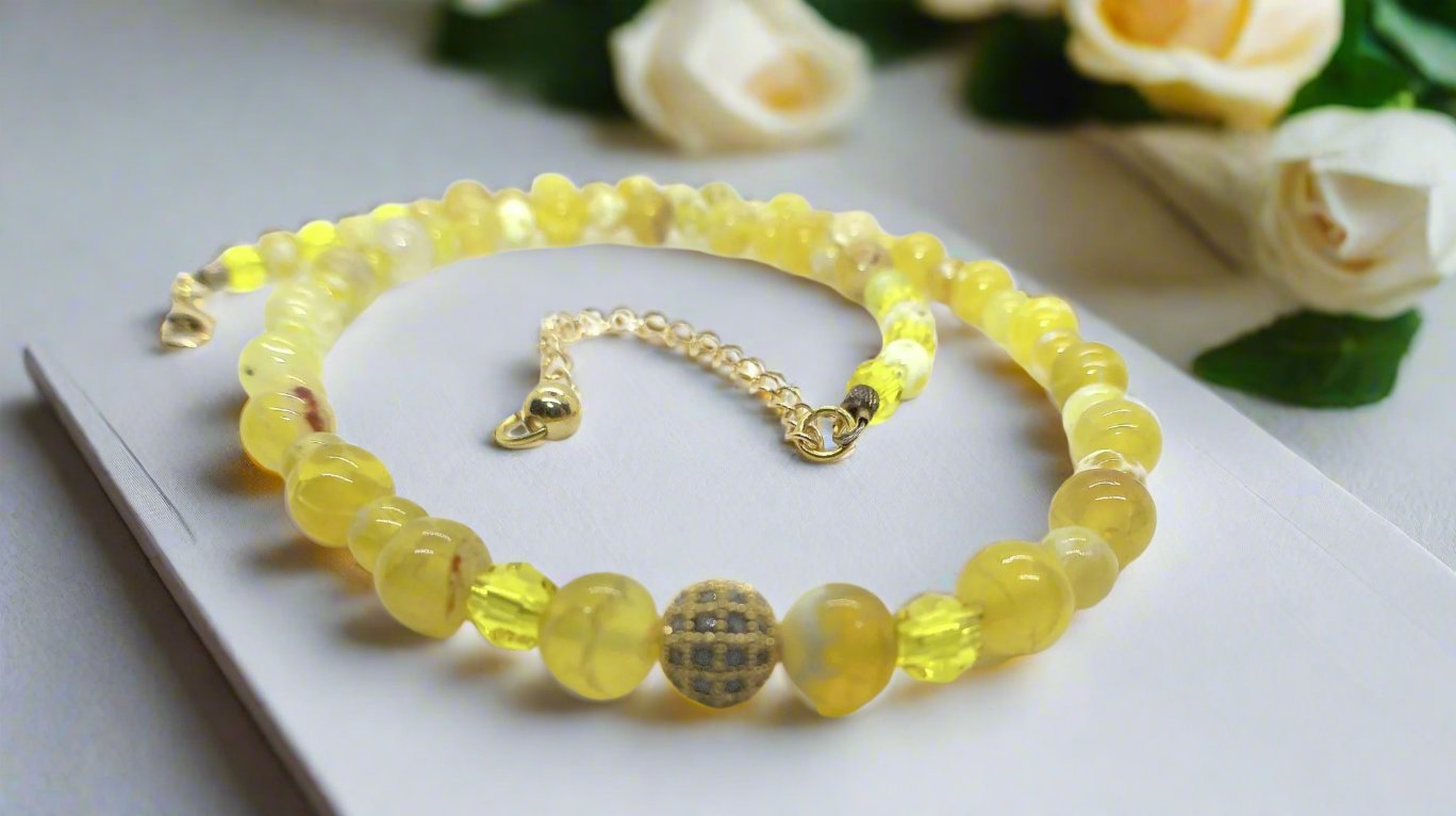 https://www.artistryjewelry.net/products/gorgeous-yellow-fire-agates-and-crystals-beaded-semi-precious-necklace-handcrafted-by-artistry-jewelry