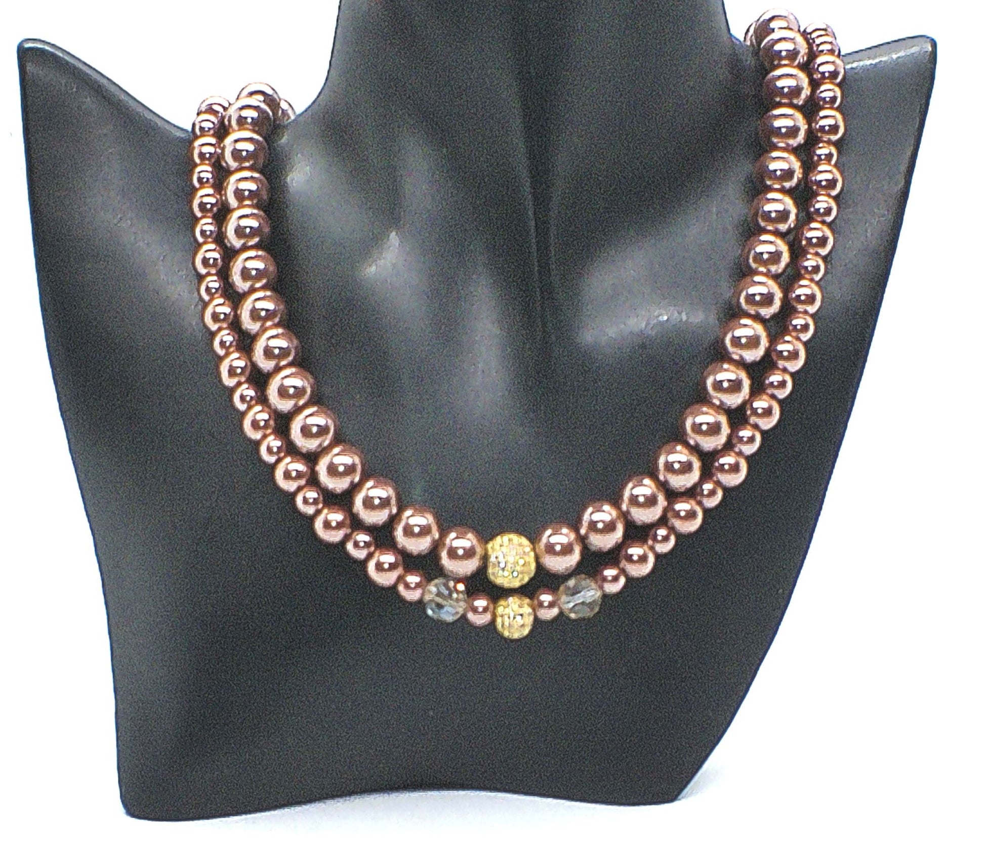 https://www.artistryjewelry.net/products/stunning-crystal-pearl-and-druk-two-strand-beaded-necklace