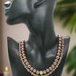 https://www.artistryjewelry.net/products/stunning-crystal-pearl-and-druk-two-strand-beaded-necklace