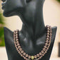 https://www.artistryjewelry.net/products/stunning-crystal-pearl-and-druk-two-strand-beaded-necklace