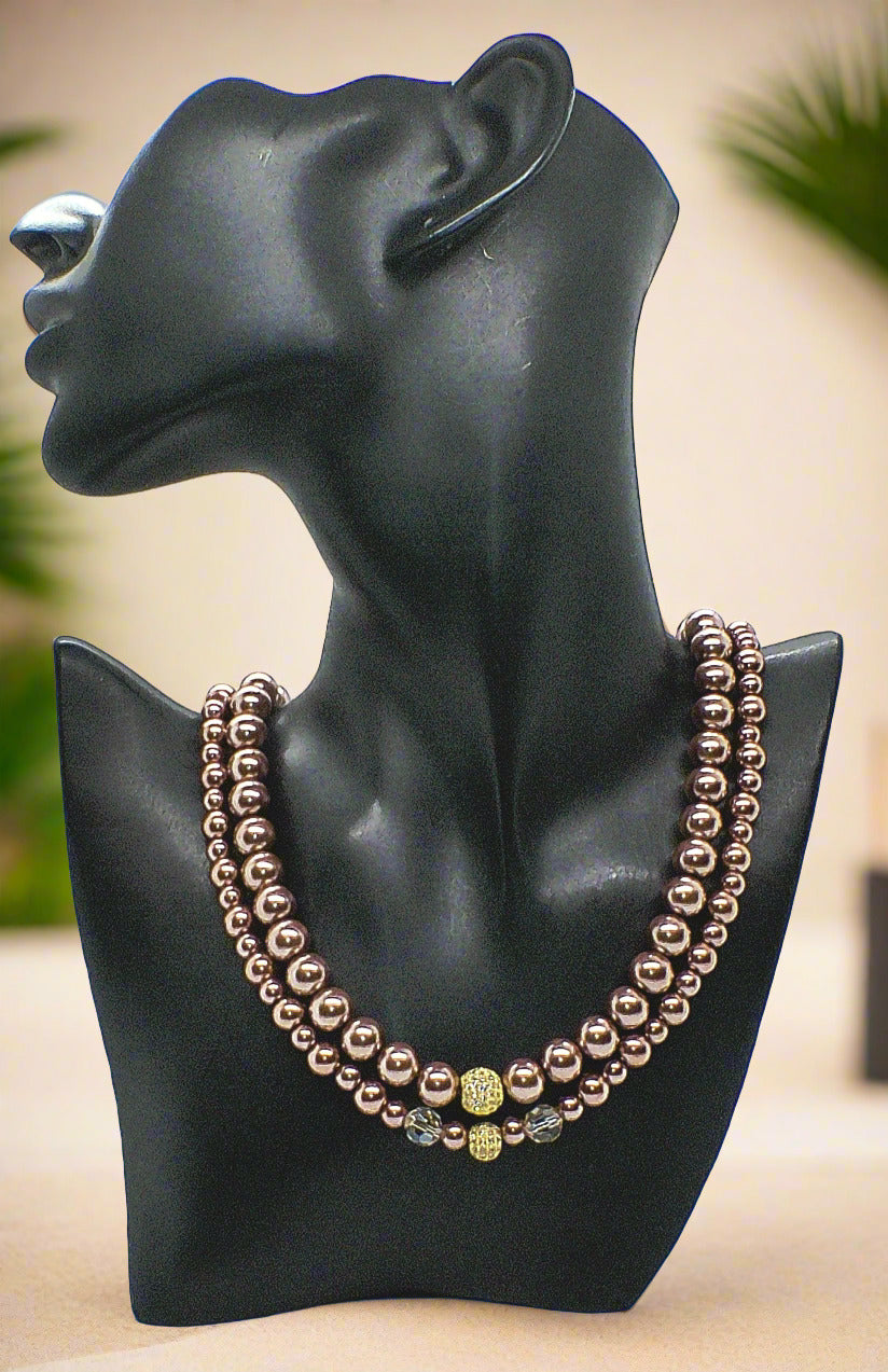 https://www.artistryjewelry.net/products/stunning-crystal-pearl-and-druk-two-strand-beaded-necklace