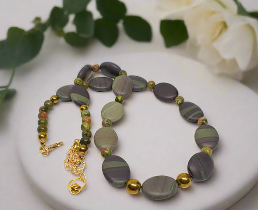 https://www.artistryjewelry.net/products/alluring-mocha-mint-jasper-unakite-and-hematite-beaded-necklace-by-artistry-jewelry