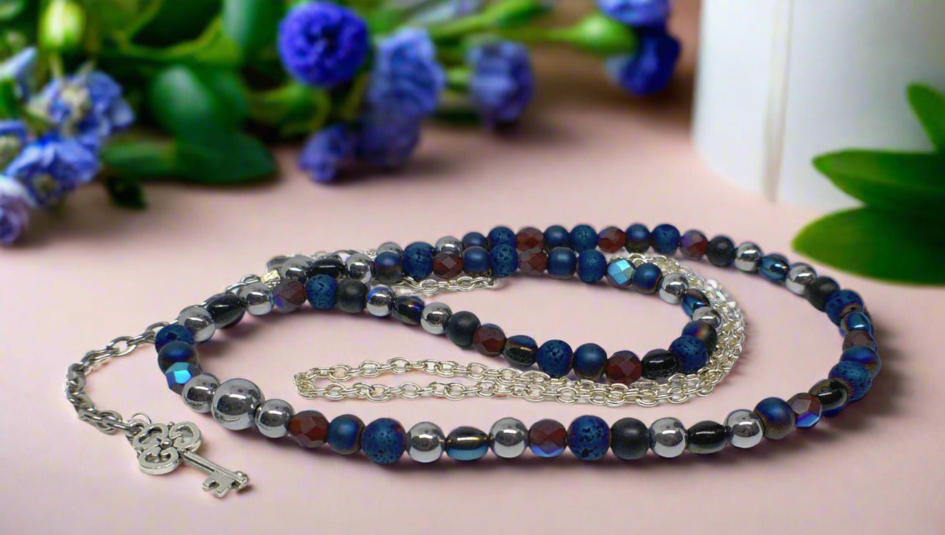 https://www.artistryjewelry.net/products/radiant-blue-natural-lava-and-hematite-beaded-two-strand-necklace