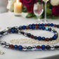 https://www.artistryjewelry.net/products/radiant-blue-natural-lava-and-hematite-beaded-two-strand-necklace