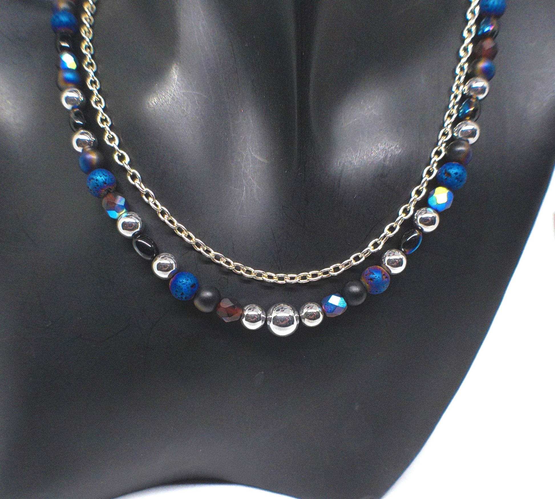 https://www.artistryjewelry.net/products/radiant-blue-natural-lava-and-hematite-beaded-two-strand-necklace