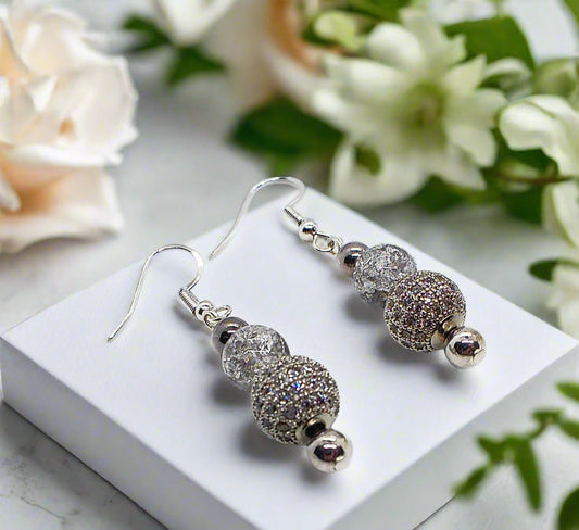 https://www.artistryjewelry.net/products/elegant-silver-and-crystal-drop-earrings