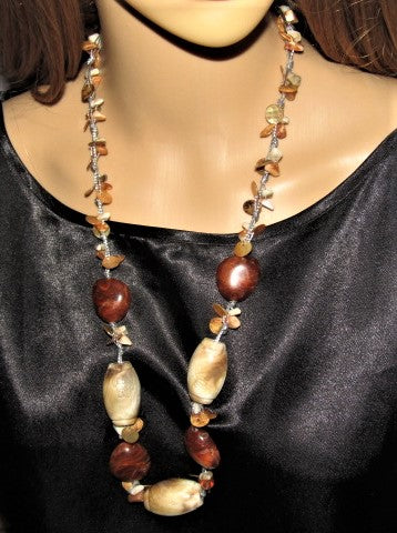 https://www.artistryjewelry.net/products/shells-galore-necklace