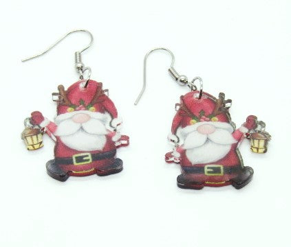 https://www.artistryjewelry.net/products/happy-santa-earrings