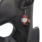 https://www.artistryjewelry.net/products/happy-santa-earrings