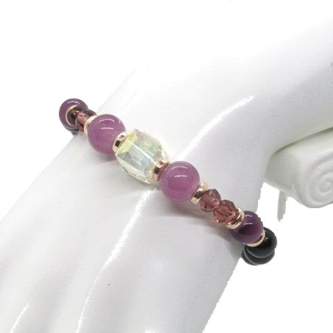 Go To: https://www.artistryjewelry.net/products/amethyst-and-black-garnet-yoga-bracelet