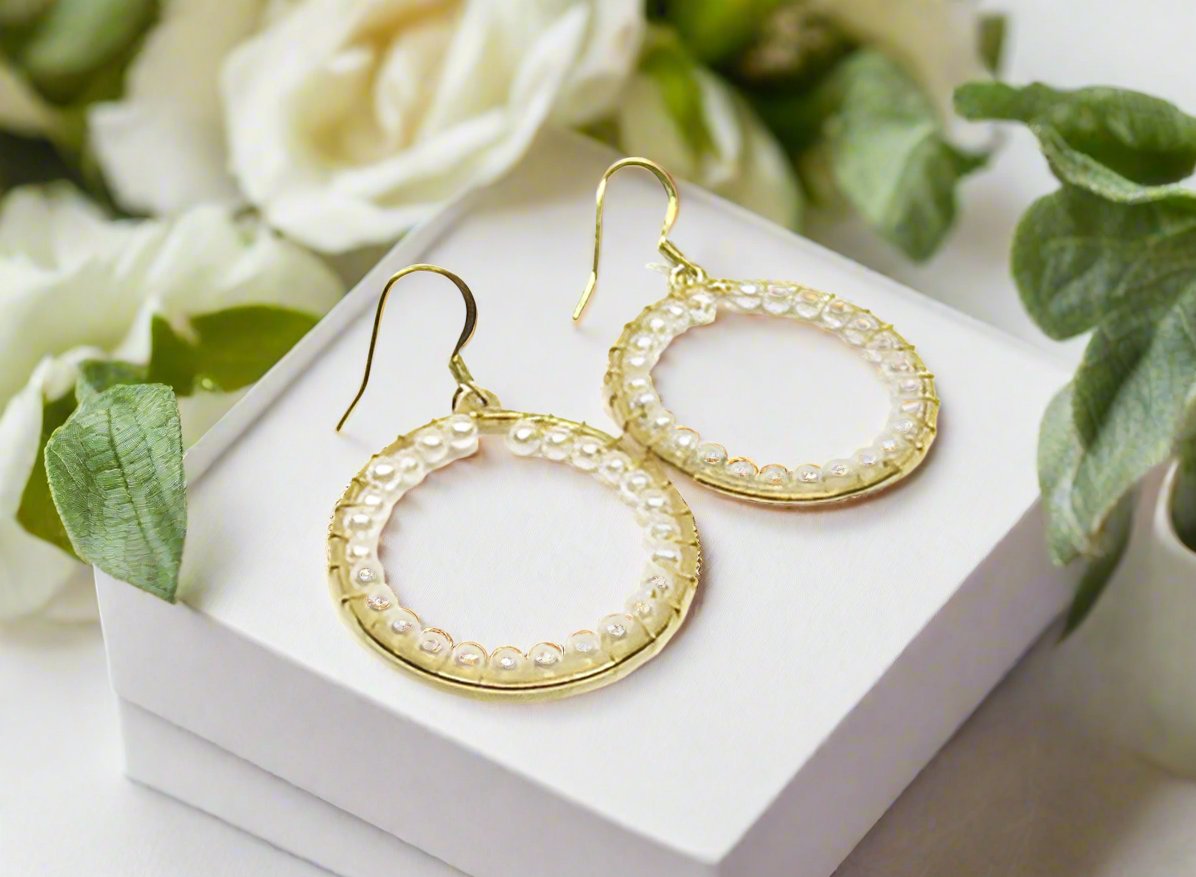 https://www.artistryjewelry.net/products/lovely-pearl-hoops-earrings