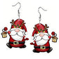 https://www.artistryjewelry.net/products/happy-santa-earrings